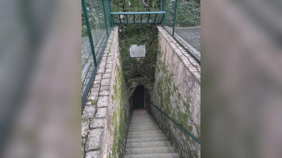 Stairs leading down to the entrance of the Villars Cave.