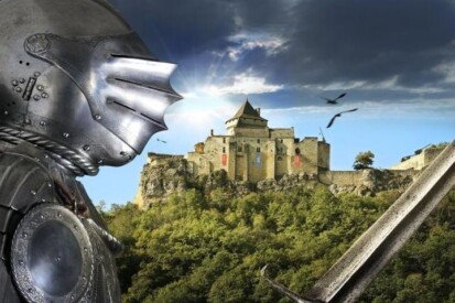 Main image of Castelnaud Castle with a suit of armor in the foreground
