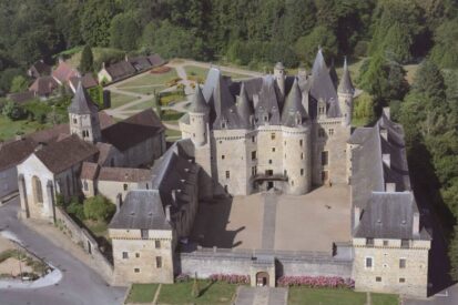 Aerial view of Jumilhac Castle and its rooftops
