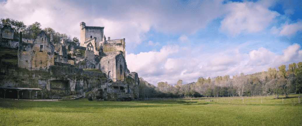Commarque Castle overlooking the meadow